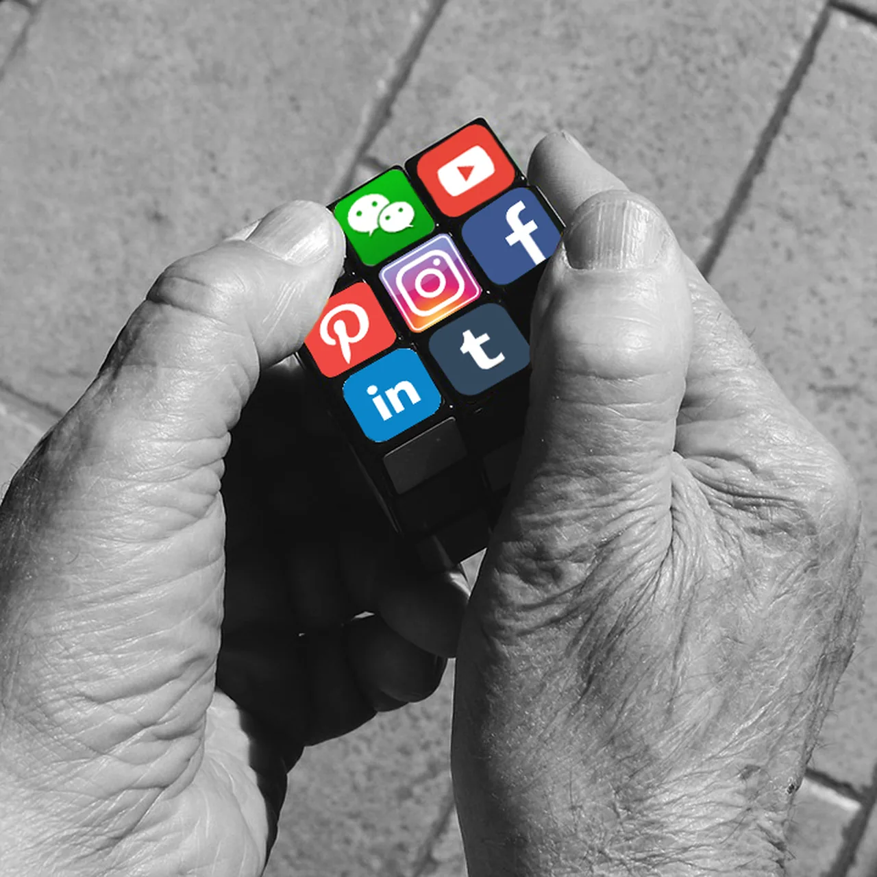 Rubik's Cube surrounded by social platform icons in a social media strategy illustration.
